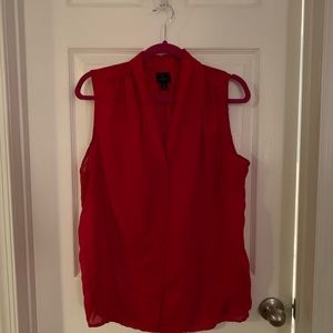 Red sleeveless blouse